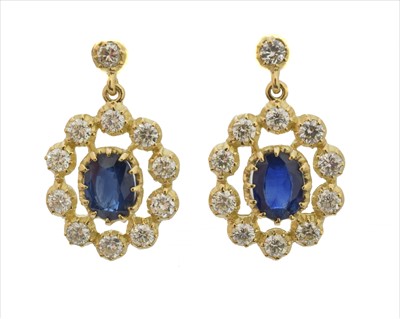 Lot 94 - A pair of sapphire and diamond earrings