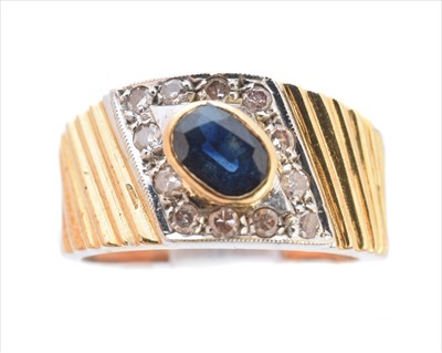 Lot 265 - A sapphire and diamond dress ring