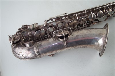 Lot 34 - Conn C Melody Saxophone in case.