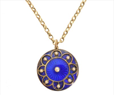 Lot 140 - An early 20th century enamel and seed pearl pendant