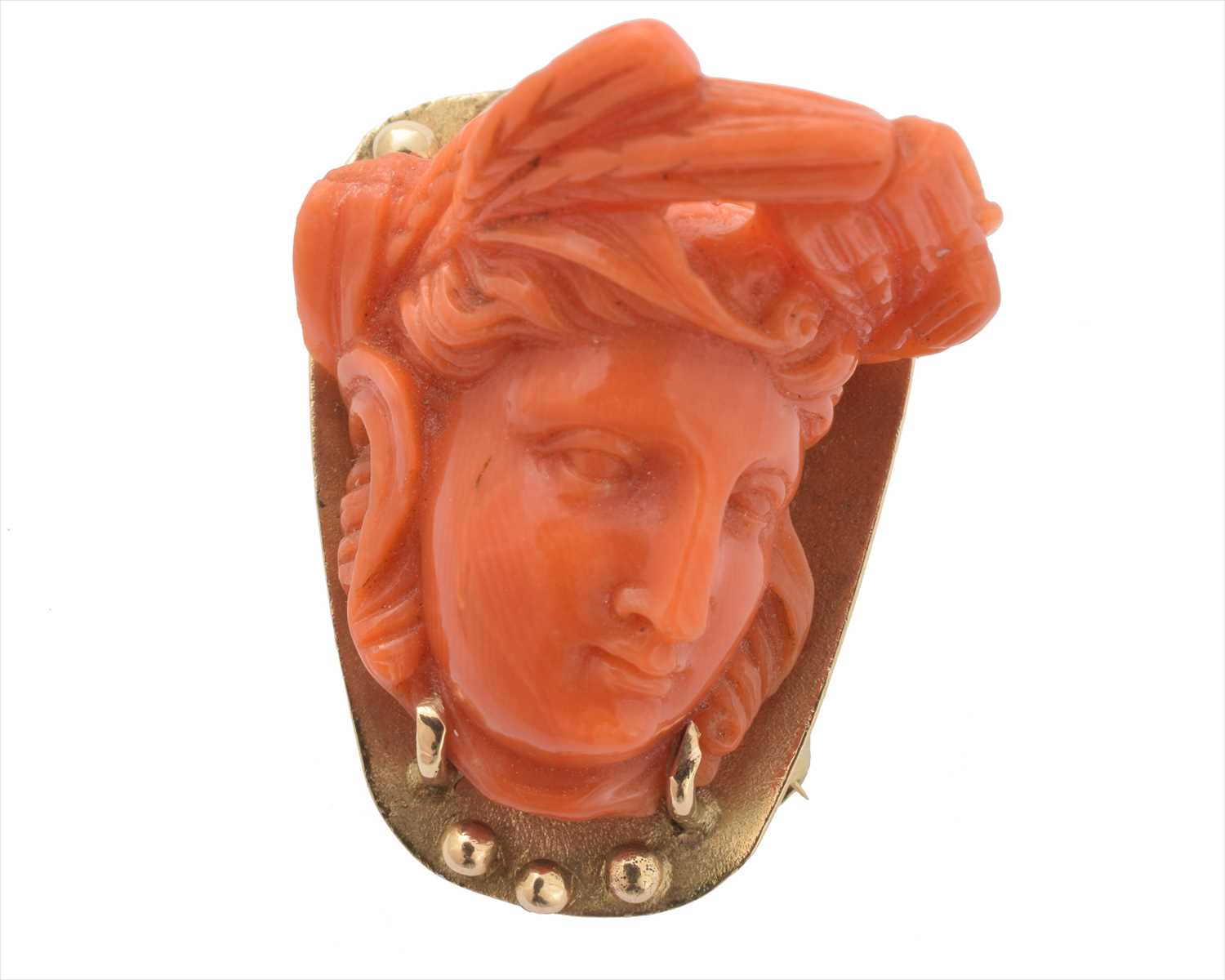 Lot 57 - A coral brooch