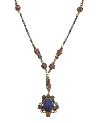 Lot 144 - An enamel garnet ruby and lapis lazuli necklace
