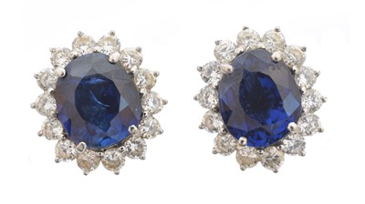 Lot 81 - A pair of sapphire and diamond earrings