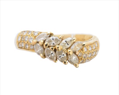 Lot 150 - An 18ct gold diamond band ring