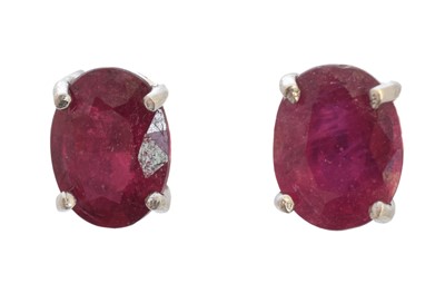 Lot 77 - A pair of glass-filled ruby stud earrings