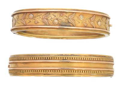 Lot 32 - Two Victorian hinged bangles
