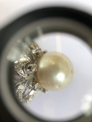 Lot 128 - A natural saltwater pearl and diamond cluster ring