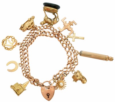 Lot 25 - A 9ct gold charm bracelet