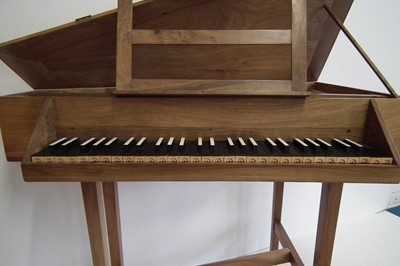 Lot 22 - Triangular spinet by John Storr built from a kit, walnut  case with ebony and ivory faced keys 115cm long with tuning key and spare parts