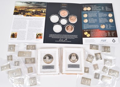 Lot 21 - The Stamps of Royalty Silver Stamp Collection, twenty three silver stamp replicas and others.