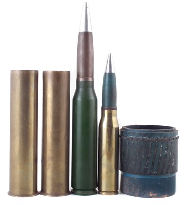 Lot 317 - Four Ammunition rounds and a driving band