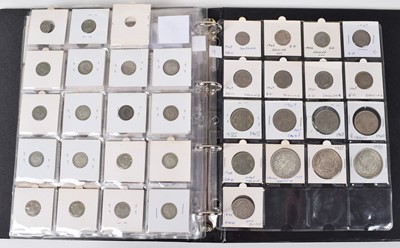 Lot 74 - One album of historical mainly silver British coinage dating from George II through to George VI.
