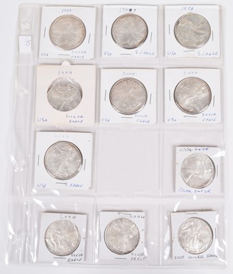 Lot 9 - One sheet of silver Eagle 1oz silver dollars (11).