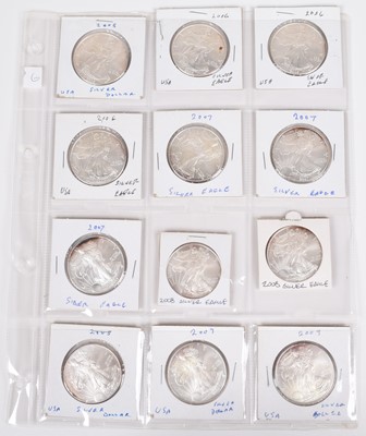Lot 10 - One sheet of silver Eagle 1oz silver dollars (12).