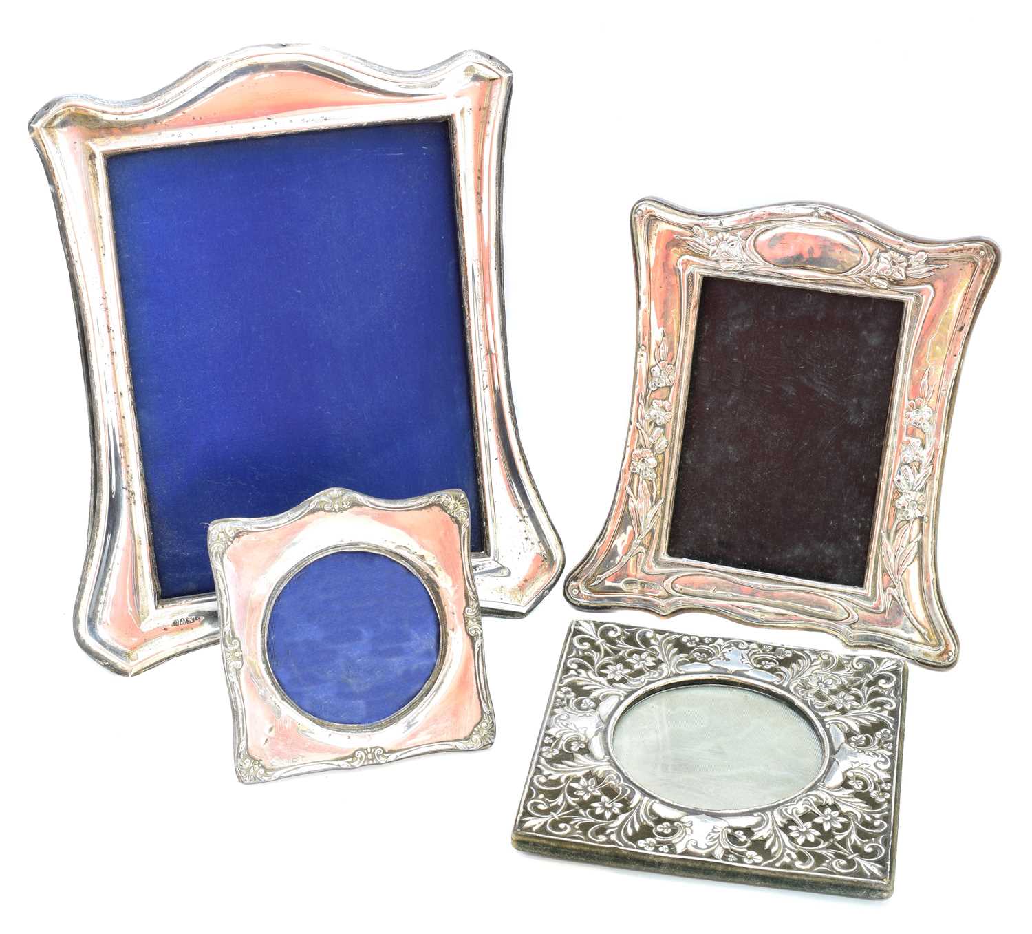 Lot 31 - Four early 20th century silver fronted picture frames