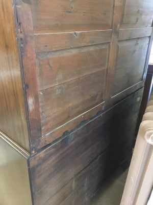 Lot 215 - George III figured mahogany press cupboard
