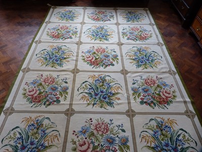 Lot 166 - 20th century tapestry carpet with 15 panels of flower design 374 x 251cm