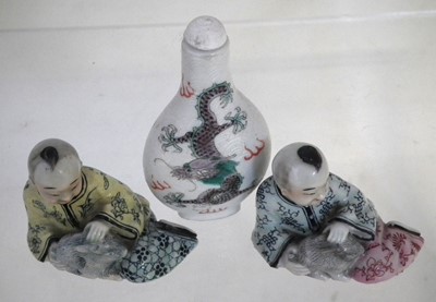 Lot 129 - Pair of Chinese porcelain figures and a snuff bottle