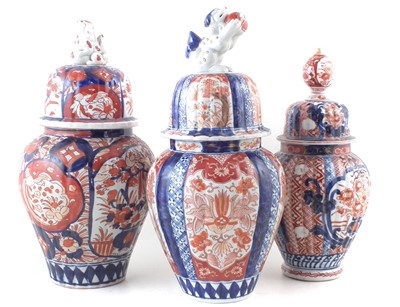 Lot 158 - Three similar Japanese lidded vases