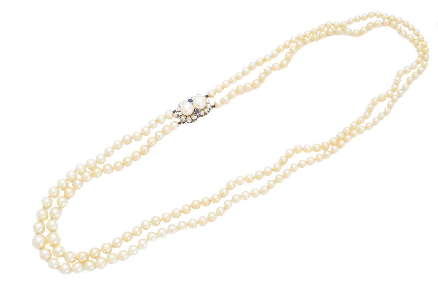 Lot 88 - A mid 20th century cultured pearl and sapphire necklace