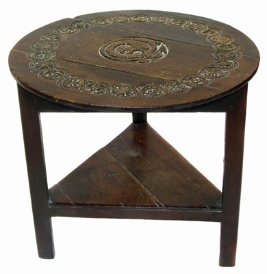 Lot 194 - George III oak cricket table with later Victorian carving