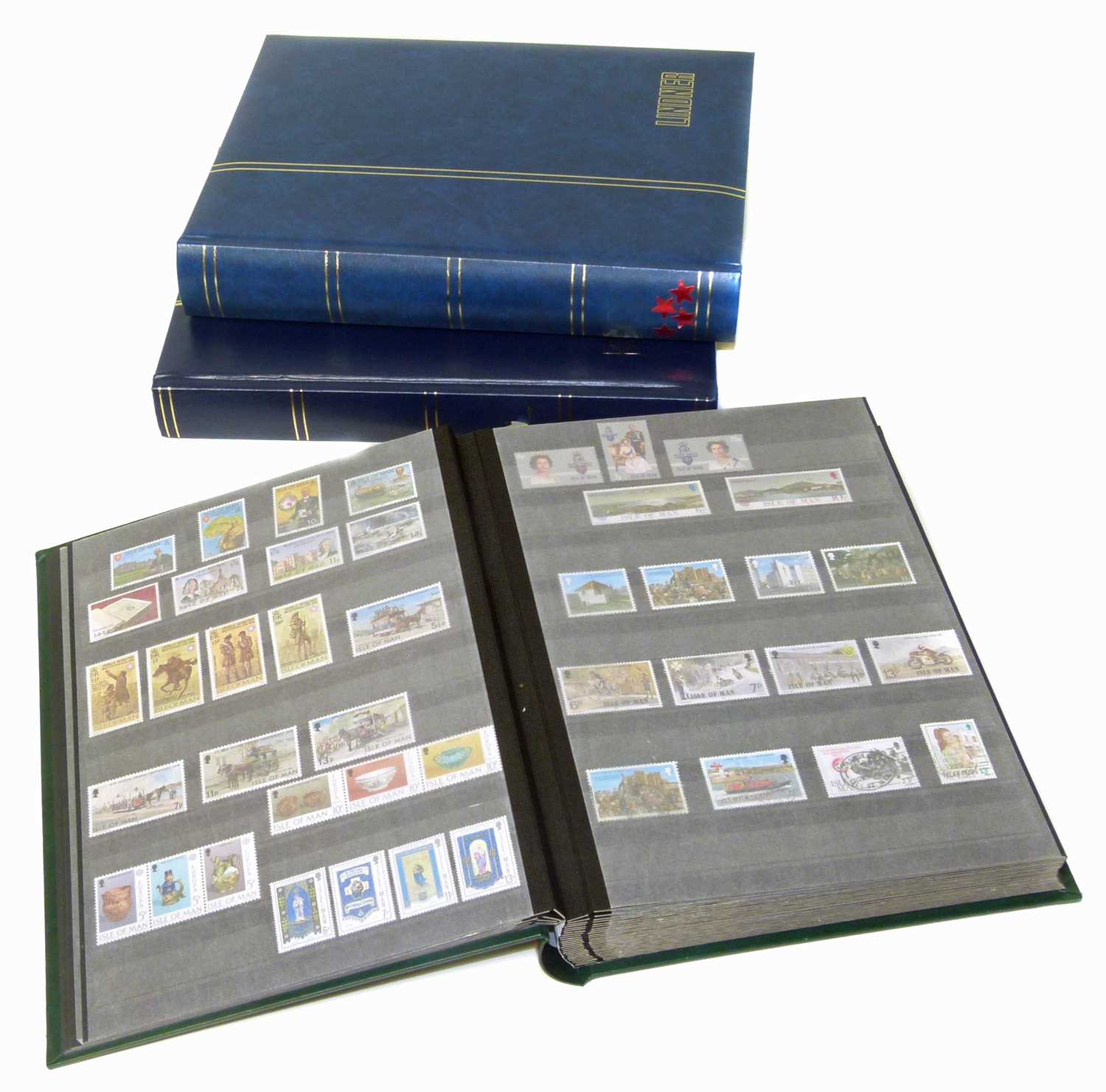 Lot 83 - Channel Islands, Isle of Man stamps in 2 lindner stockbooks, plus a further volume of Ireland.