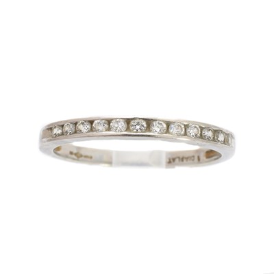 Lot 186 - A platinum diamond half eternity ring