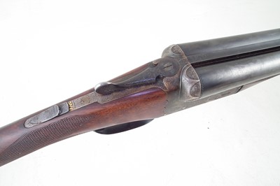 Lot 106 - F. J. Wiseman 12 bore double barrel shotgun 87044 with case.