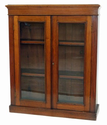 Lot 175 - Victorian mahogany two door glazed bookcase width (35") 90cms, height (42") 107cms.