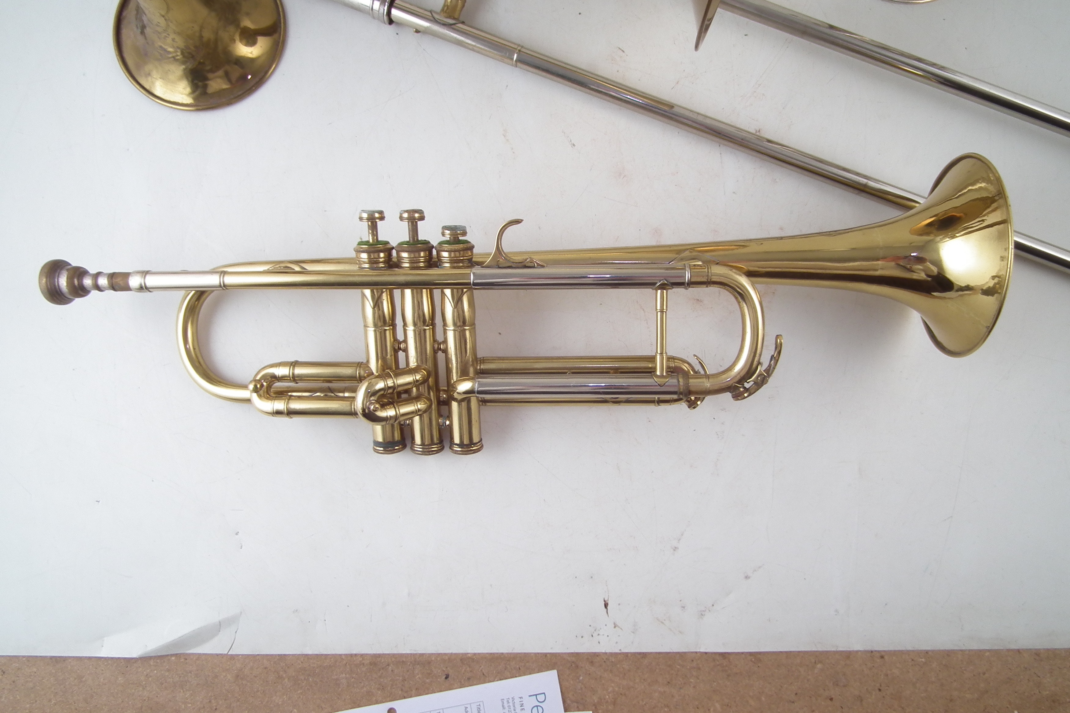 Lot 36 Two trumpets, a and a Trombone,