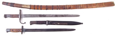 Lot 264 - Burmese Dha/Dao sword and three bayonets