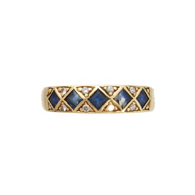 Lot 195 - A sapphire and diamond band ring