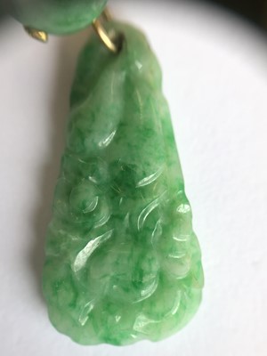 Lot 47 - A pair of jade earrings