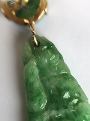 Lot 47 - A pair of jade earrings