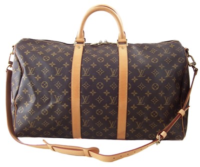 Lot 92 - A Louis Vuitton monogram Keepall Bandoulière 50 luggage bag