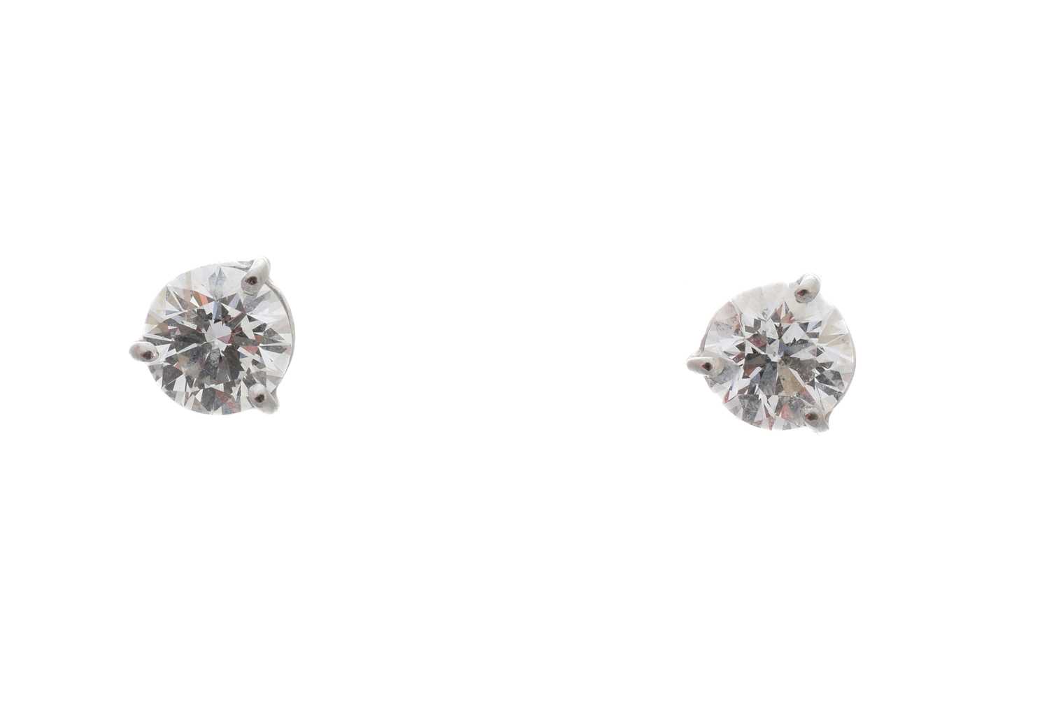 Lot 41 - A pair of brilliant-cut diamond stud earrings