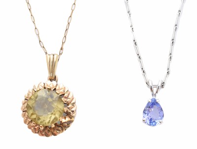 Lot 75 - Two gem-set pendants