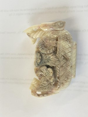 Lot 247 - An opal carving