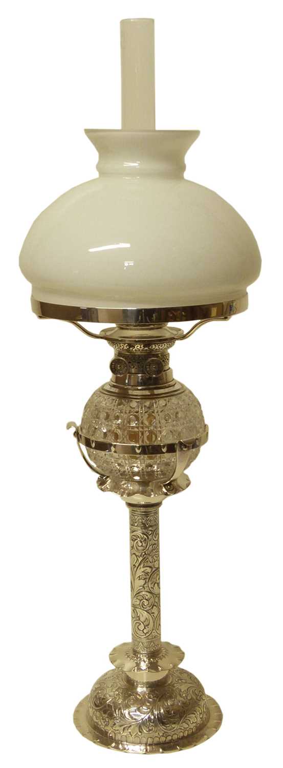 Lot 318 - Late Victorian silver plated candle lamp of cylindrical form.