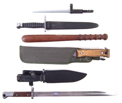 Lot 257 - Four bayonets, a machete and a truncheon