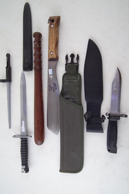Lot 257 - Four bayonets, a machete and a truncheon