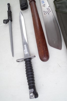 Lot 257 - Four bayonets, a machete and a truncheon