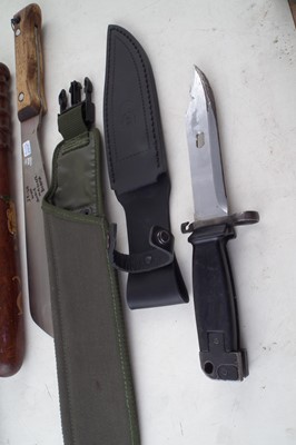 Lot 257 - Four bayonets, a machete and a truncheon