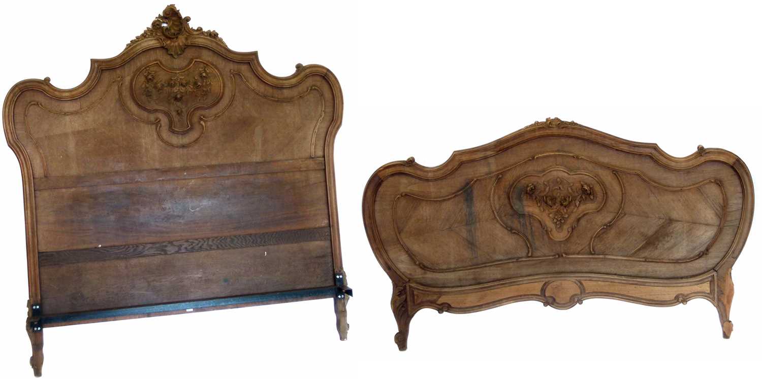 Lot 170 - Early 20th-century walnut veneered bed ends.