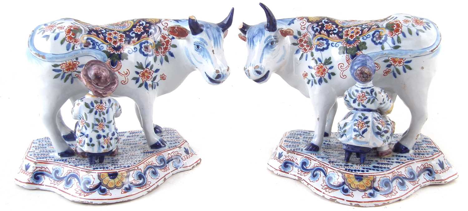 Lot 257 - Pair of Delft cows