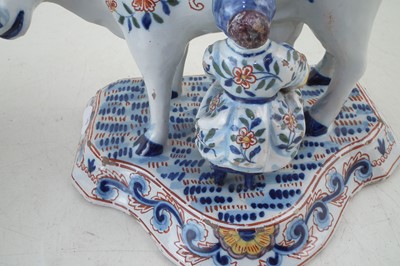 Lot 257 - Pair of Delft cows