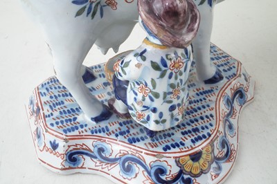 Lot 257 - Pair of Delft cows