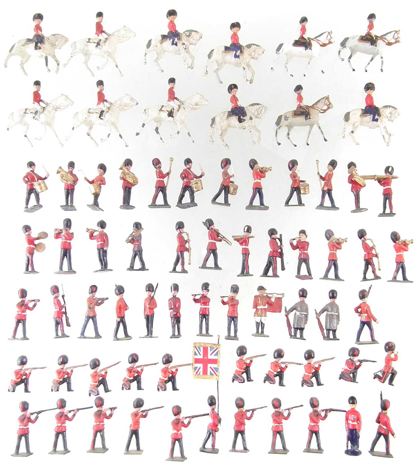 Lot 221 - Fifty seven metal British infantry soldiers by J. Hill and Co. and twelve mounted troopers.