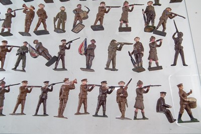 Lot 222 - Eighty six WWI metal British Infantry soldiers by J. Hill and Co and other makers, also Seven mounted soldiers.