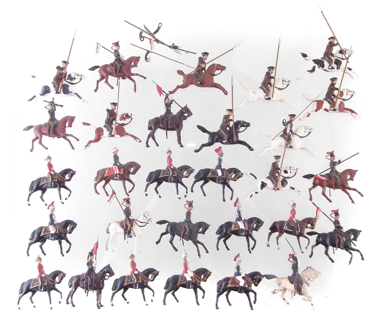 Lot 66 - Twenty nine metal British cavalry trooper toy soldiers including Lancers and Life Guards.